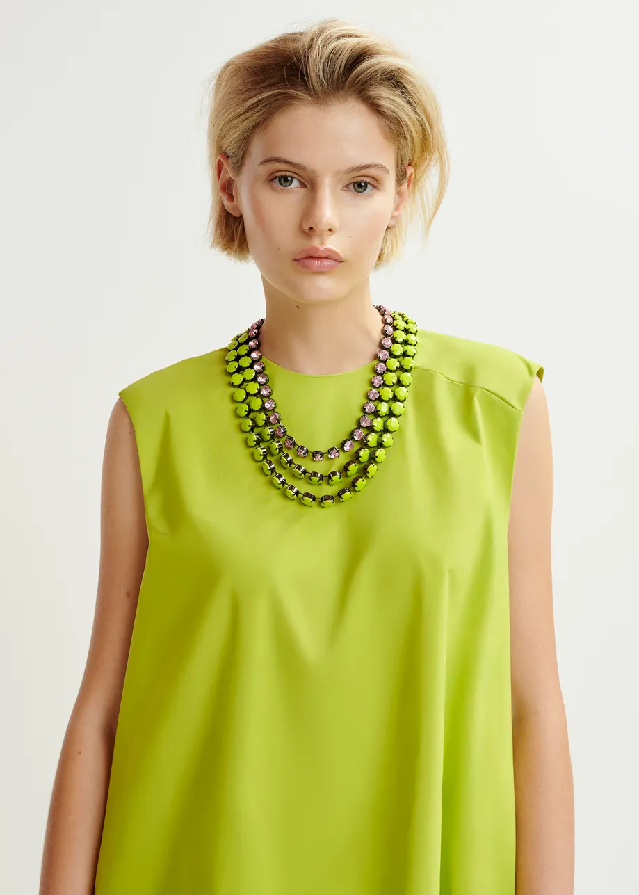 Groene mini-jurk met volants en open rug