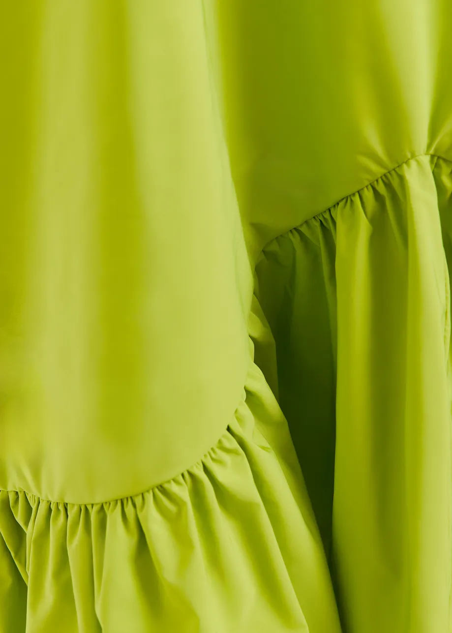 Groene mini-jurk met volants en open rug