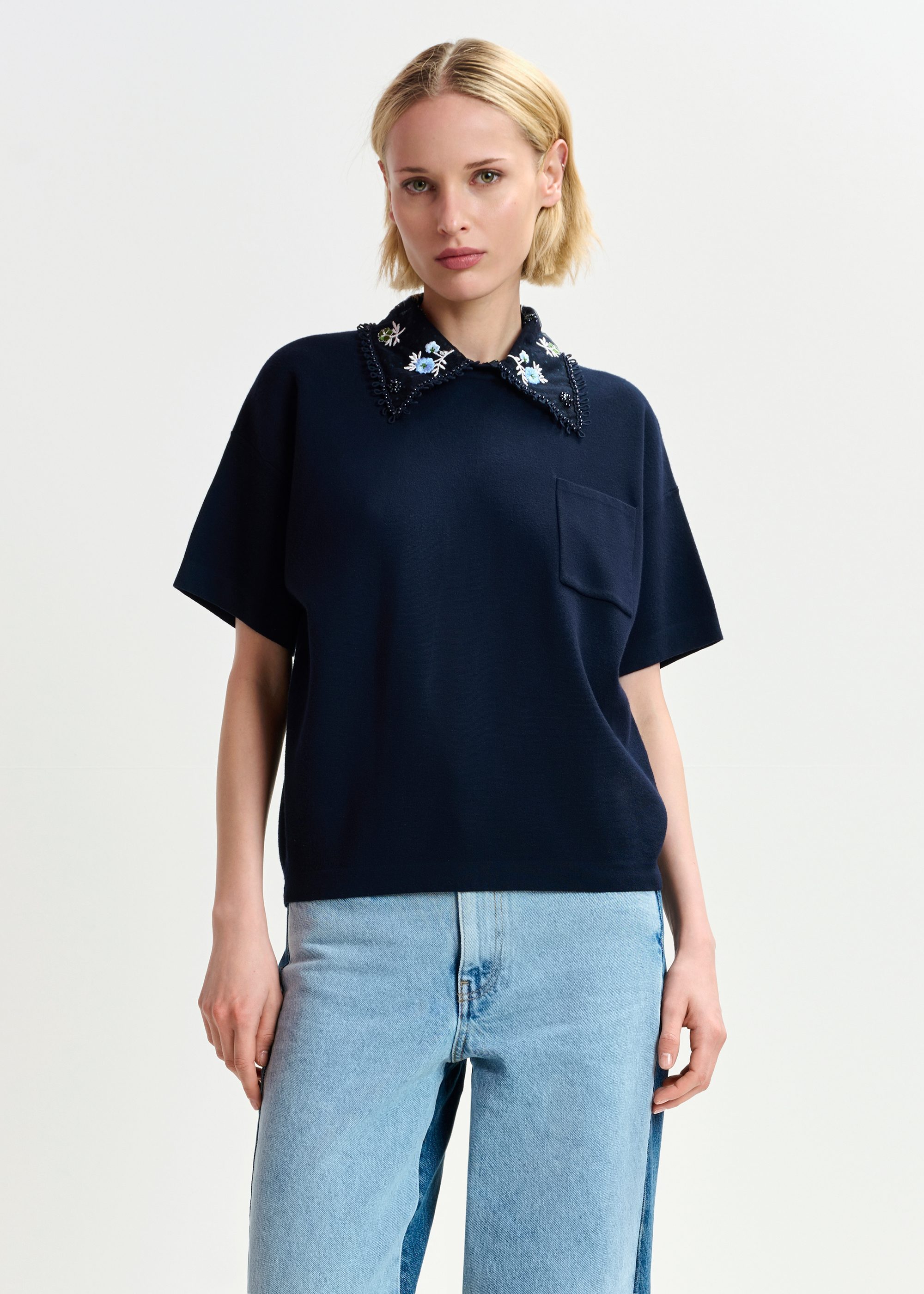 Dark blue, white and green knitted top with embroidered lace