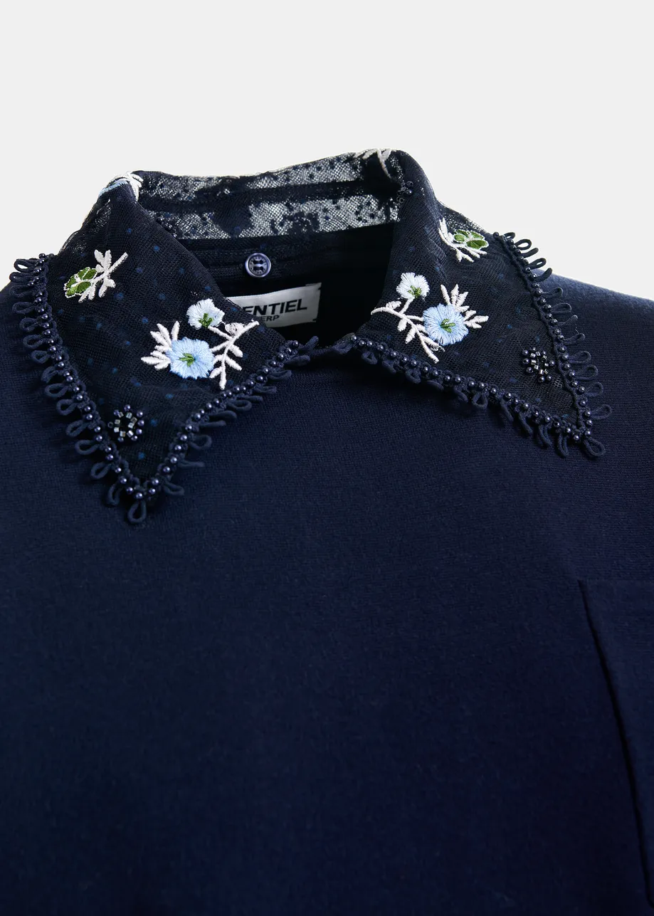 Dark blue, white and green knitted top with embroidered lace collar