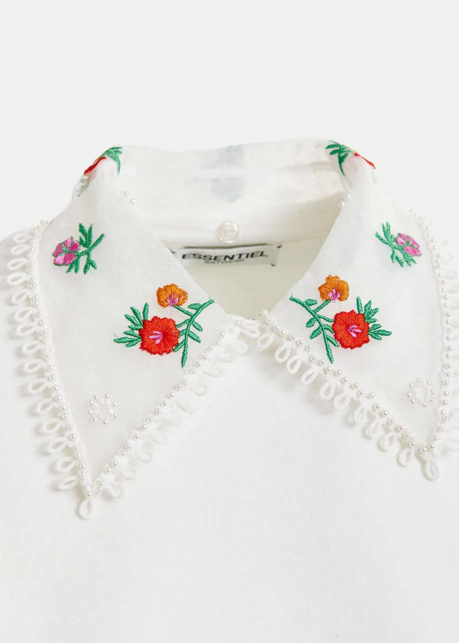 White, green and red knitted top with embroidered lace collar