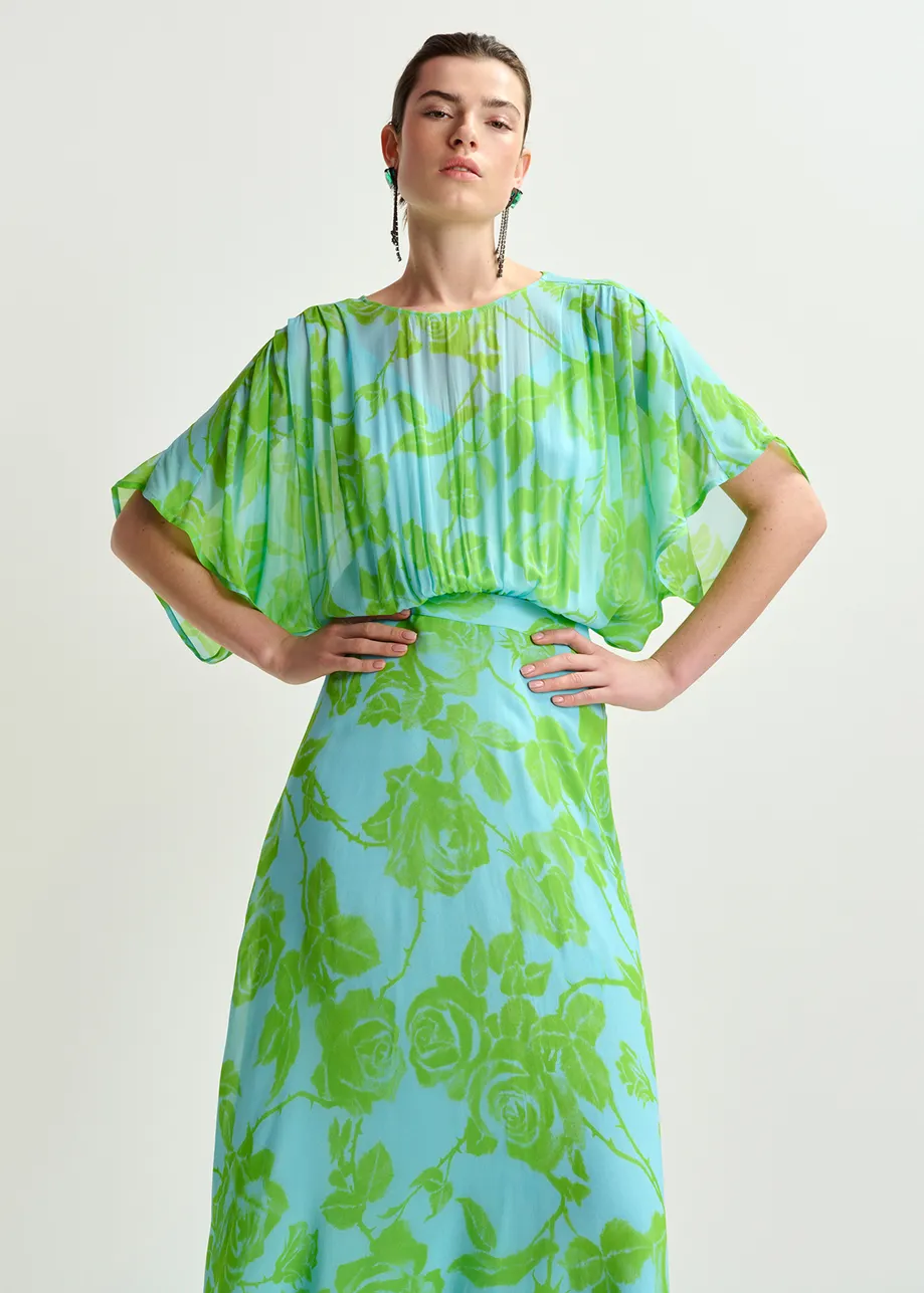 Light blue and green midi-length dress with floral print