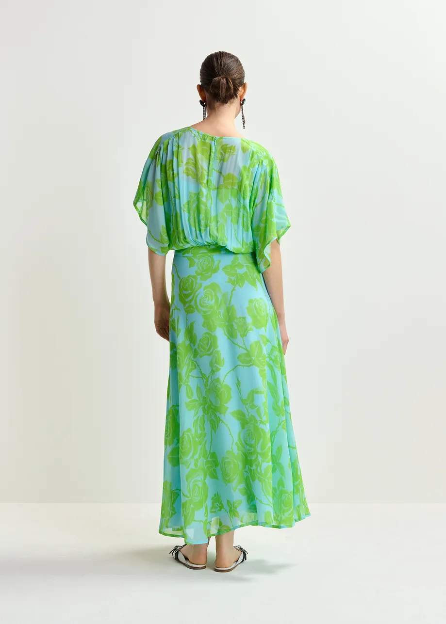 Lichtblauwe en groene midi-jurk met bloemenprint