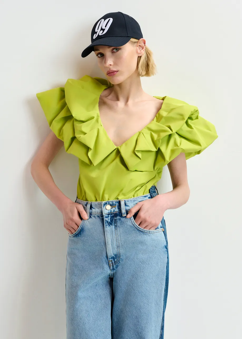 Green bodysuit with v-neck and ruffled details