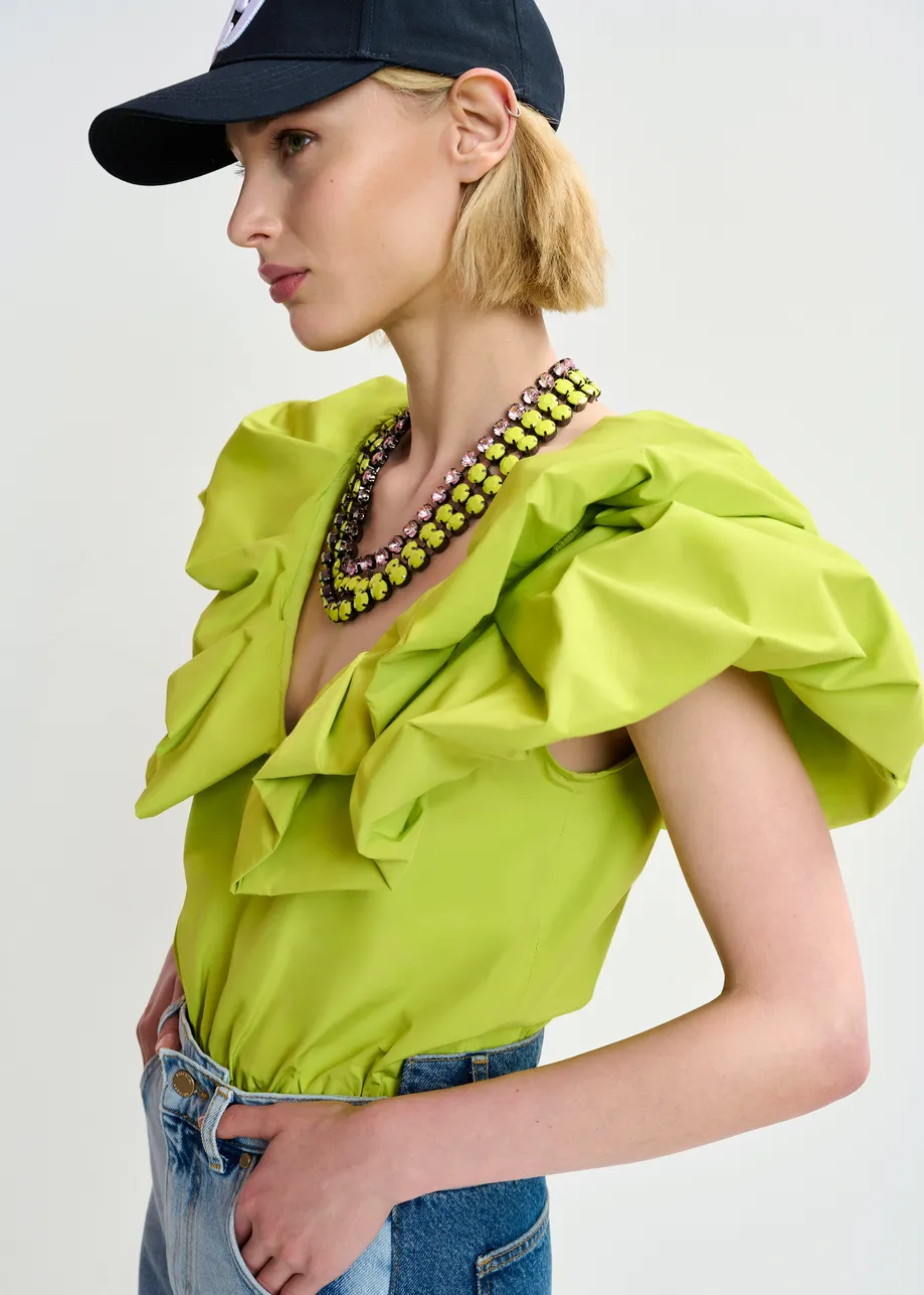 Green bodysuit with v-neck and ruffled details