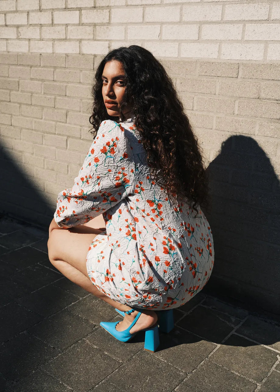 Off-white floral-print mini dress with bow-tie