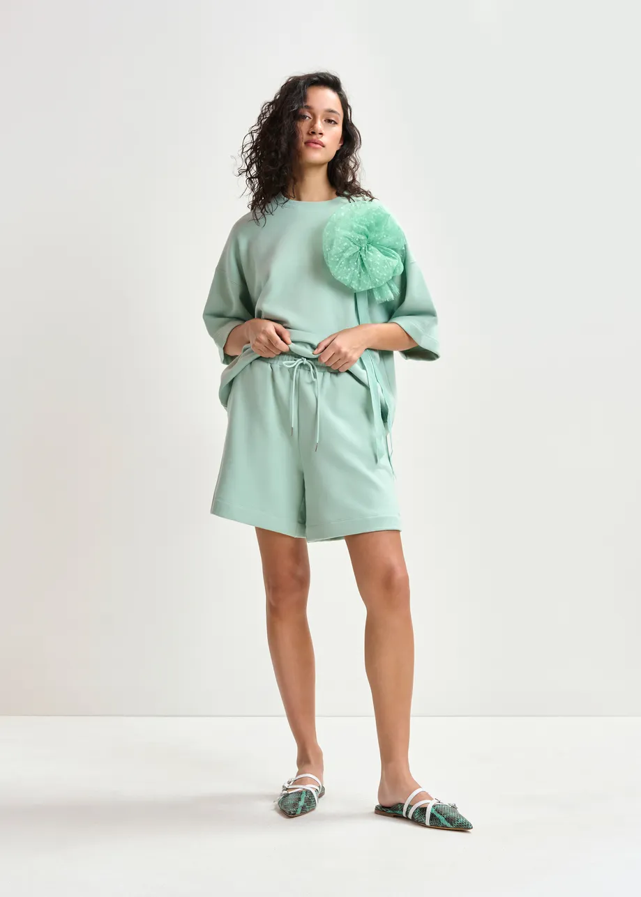 Turquoise short van katoenmix jersey