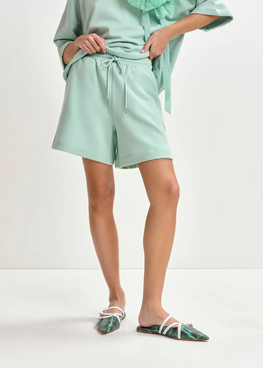 Turquoise short van katoenmix jersey