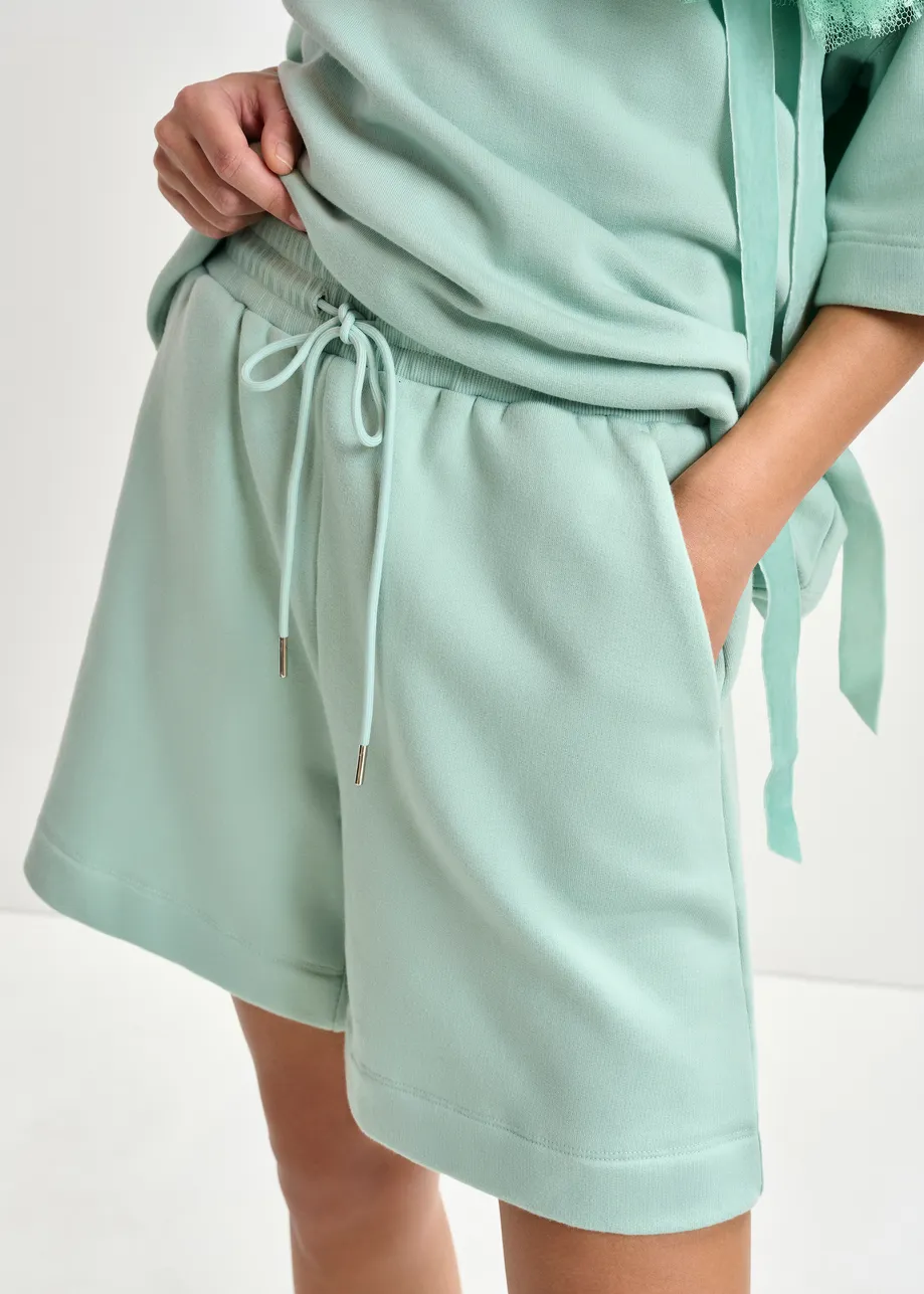 Turquoise short van katoenmix jersey