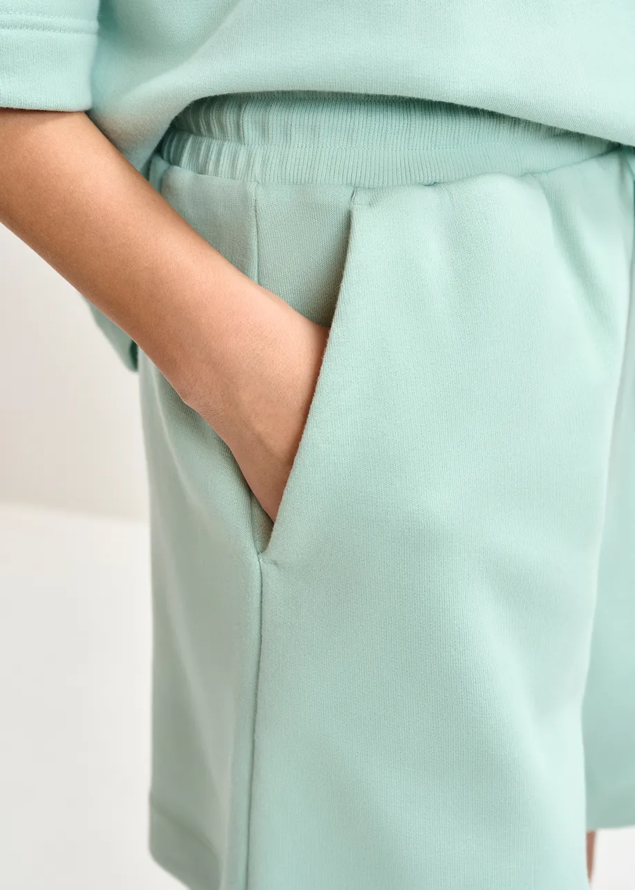 Turquoise short van katoenmix jersey