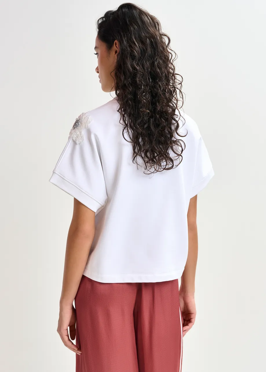  White cotton sweatshirt with sequin embroideries