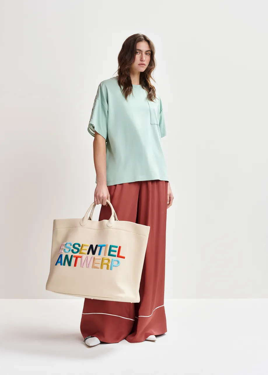 T-shirt turquoise avec dos en dentelle