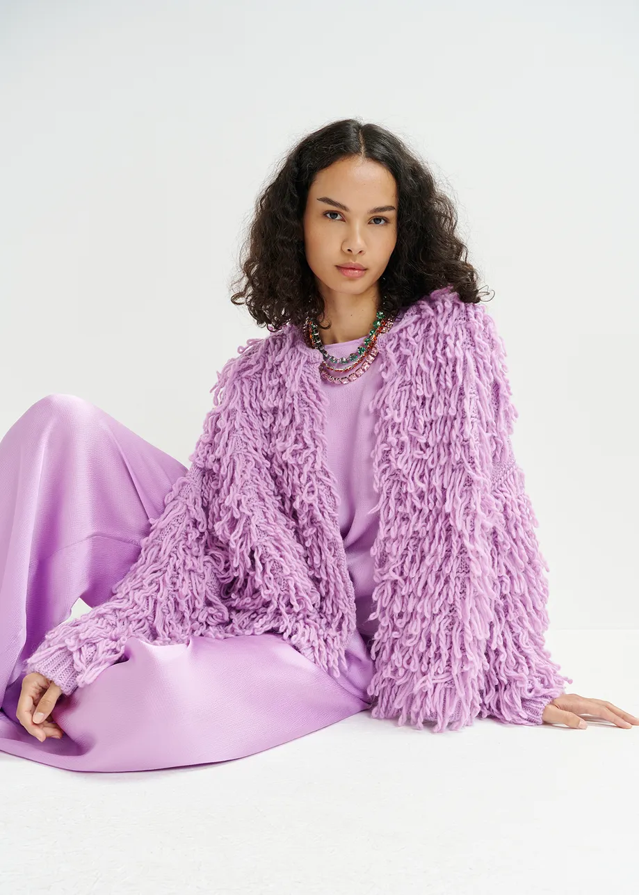 Tricot oversize lilas en maille bouclée