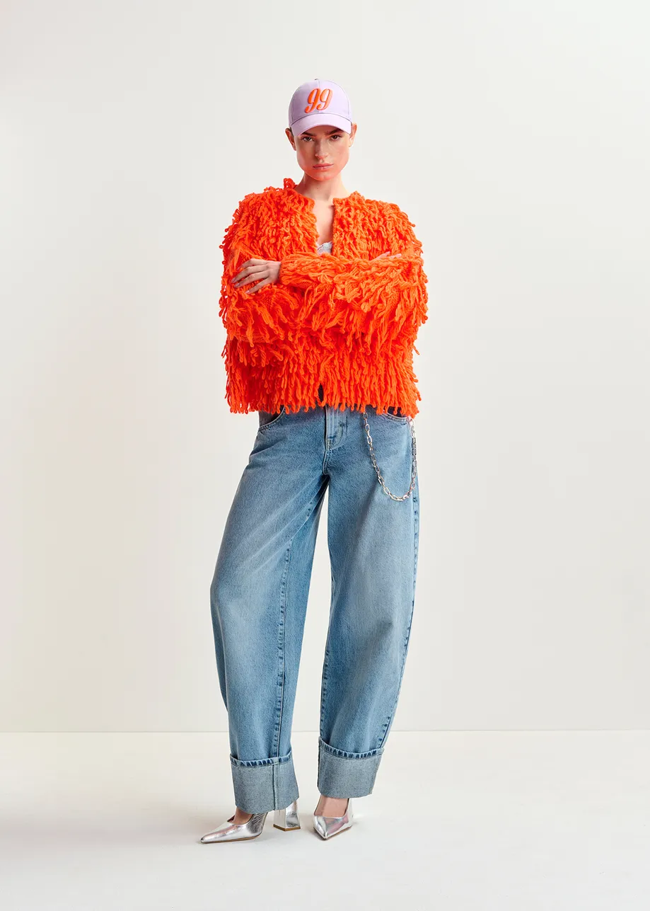 Tricot oversize orange vif en maille bouclée