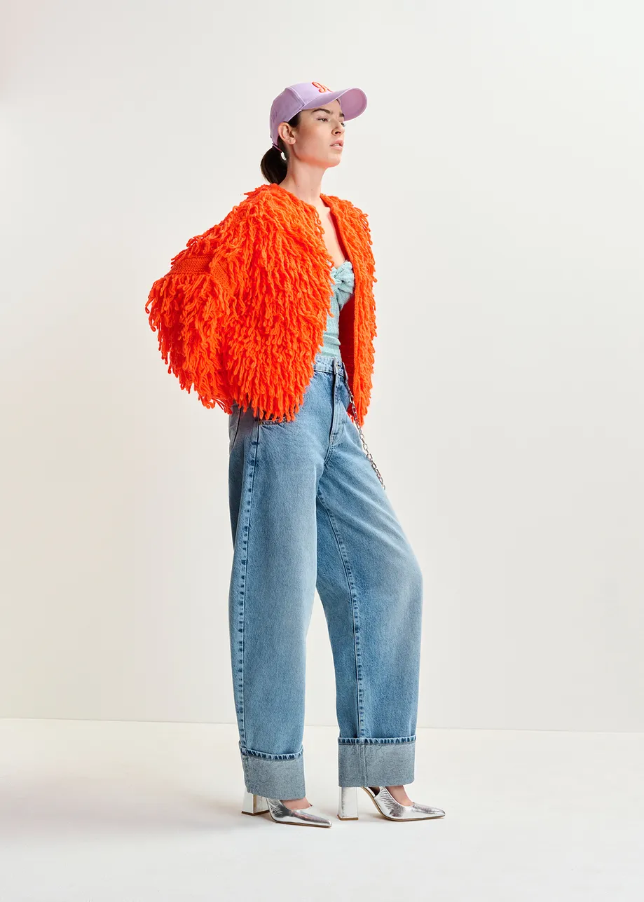 Tricot oversize orange vif en maille bouclée