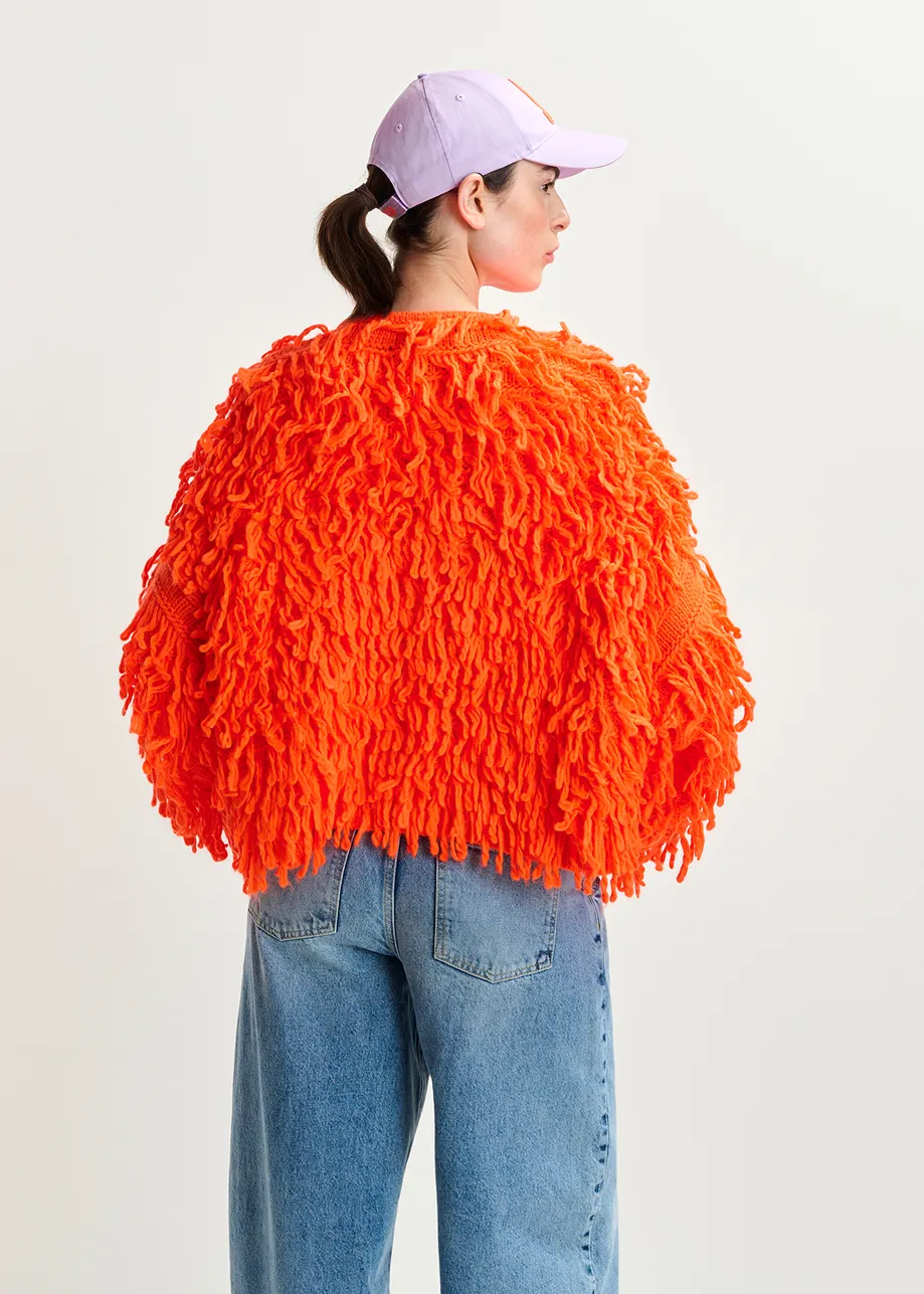 Tricot oversize orange vif en maille bouclée