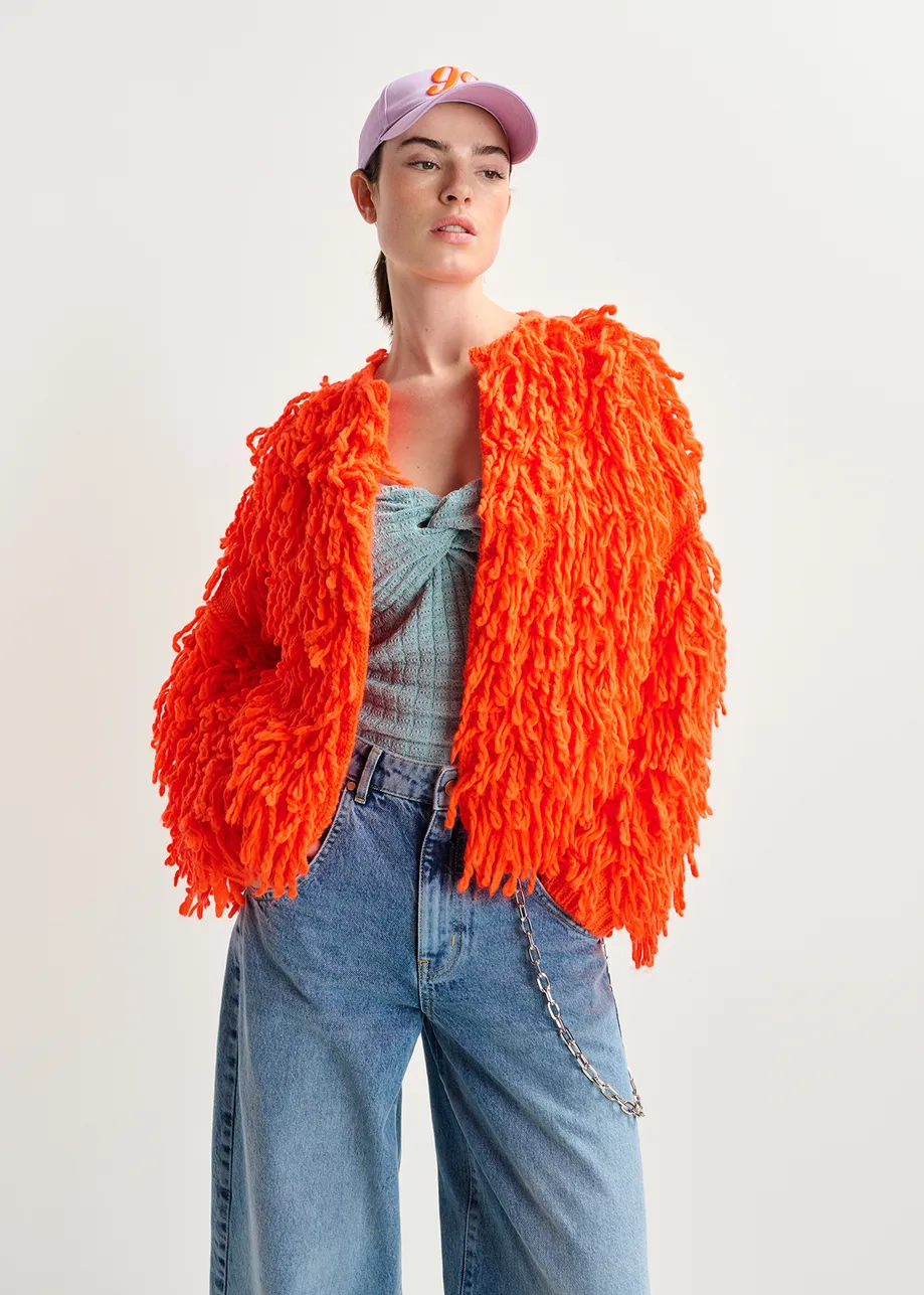 Tricot oversize orange vif en maille bouclée