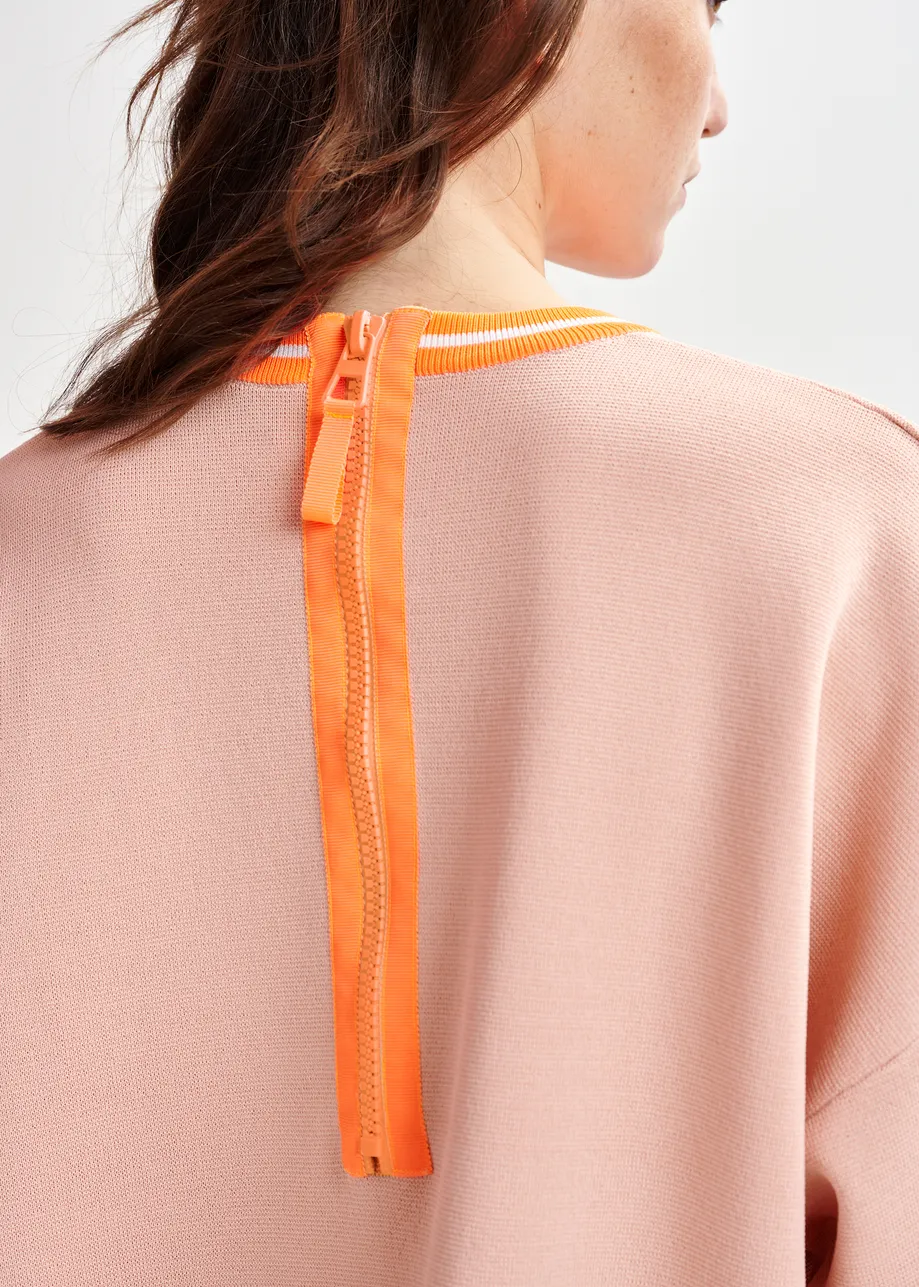 Light pink and orange knit T-shirt with contrasting trim