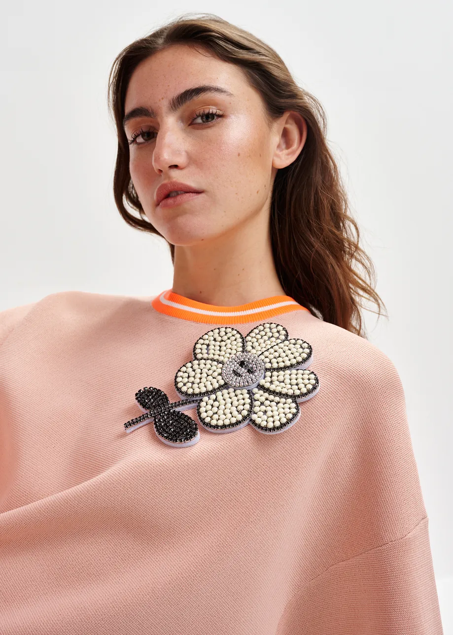 Light pink and orange knit T-shirt with contrasting trim