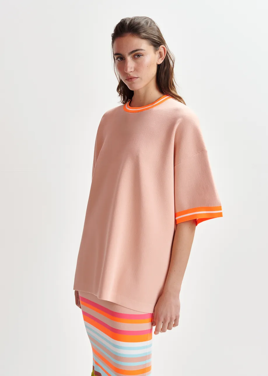 Light pink and orange knit T-shirt with contrasting trim