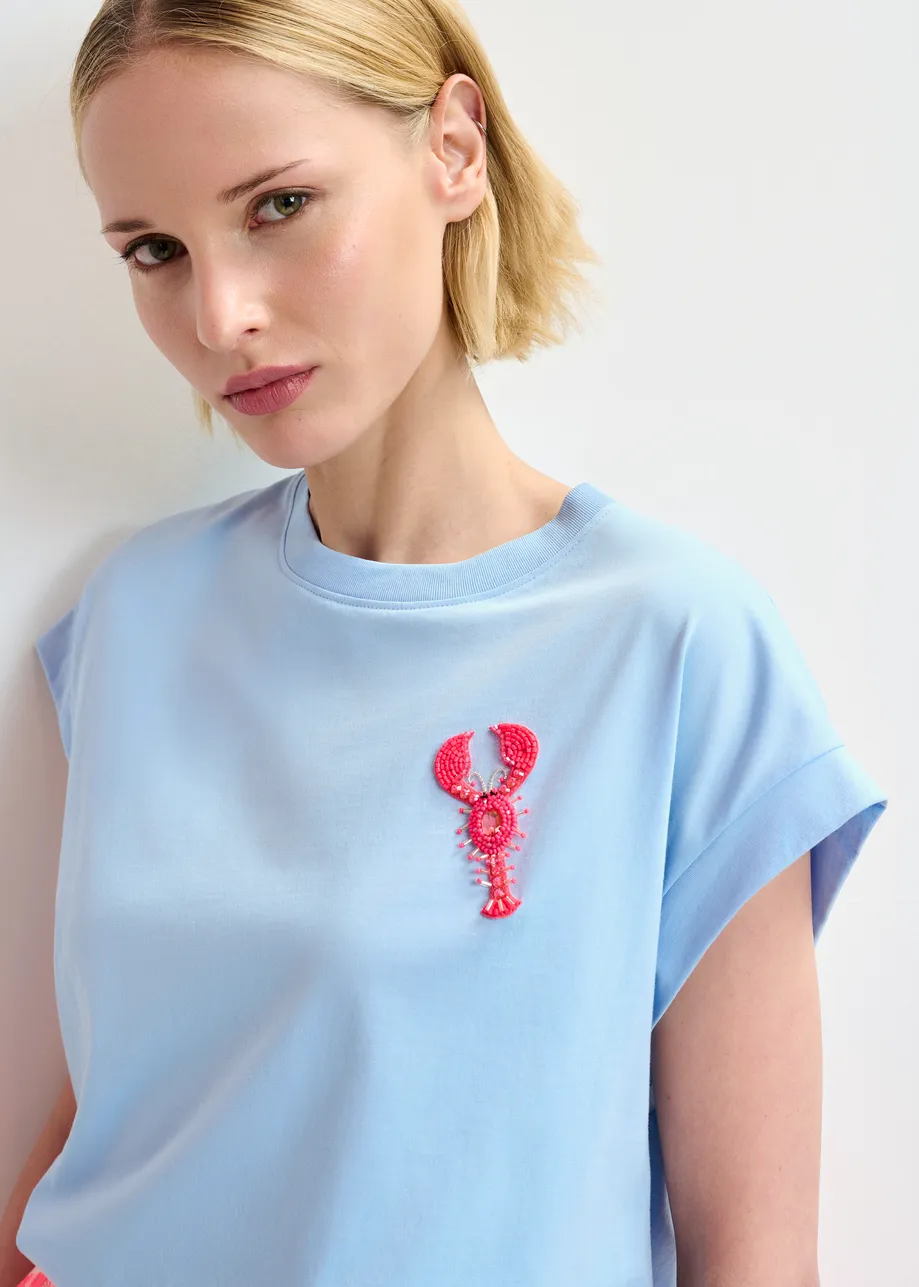 Light blue and pink organic cotton T-shirt with embroidery