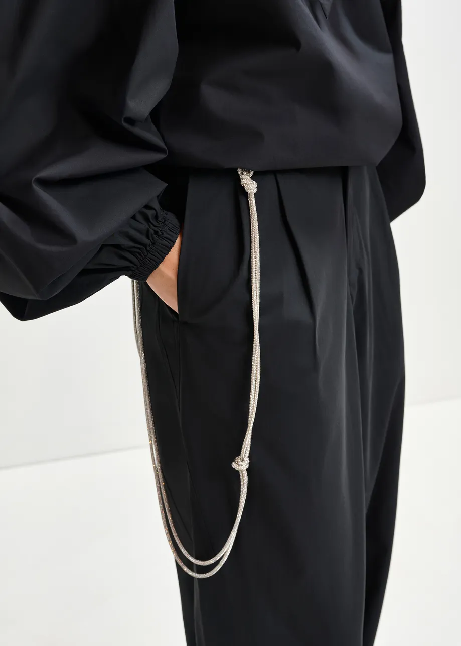 Zwarte tapse broek met strasriem