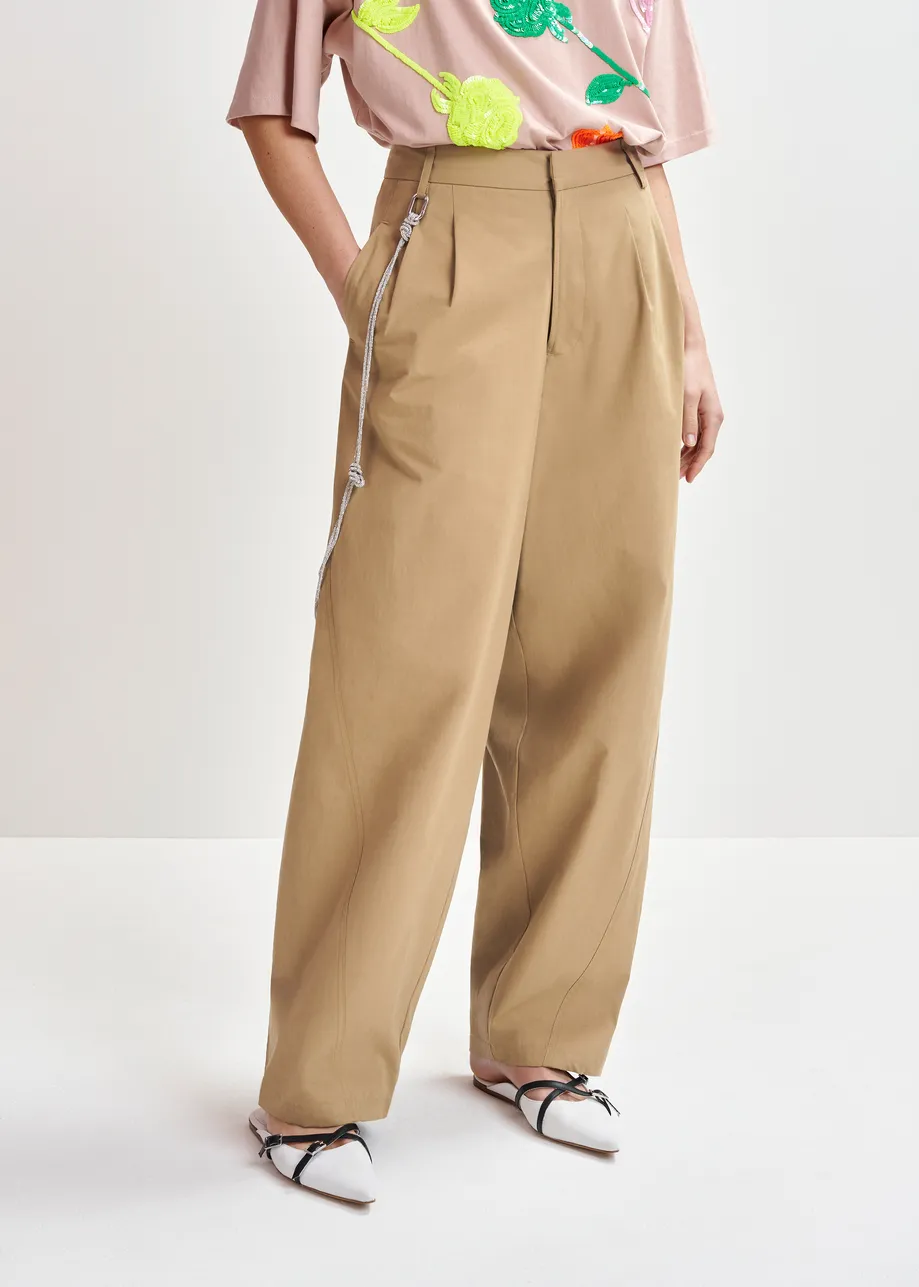 Brown tapered-leg pants with rhinestone belt