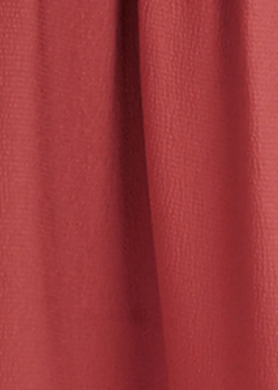 Rust red one-shoulder maxi dress with ruflles and tiered hemline