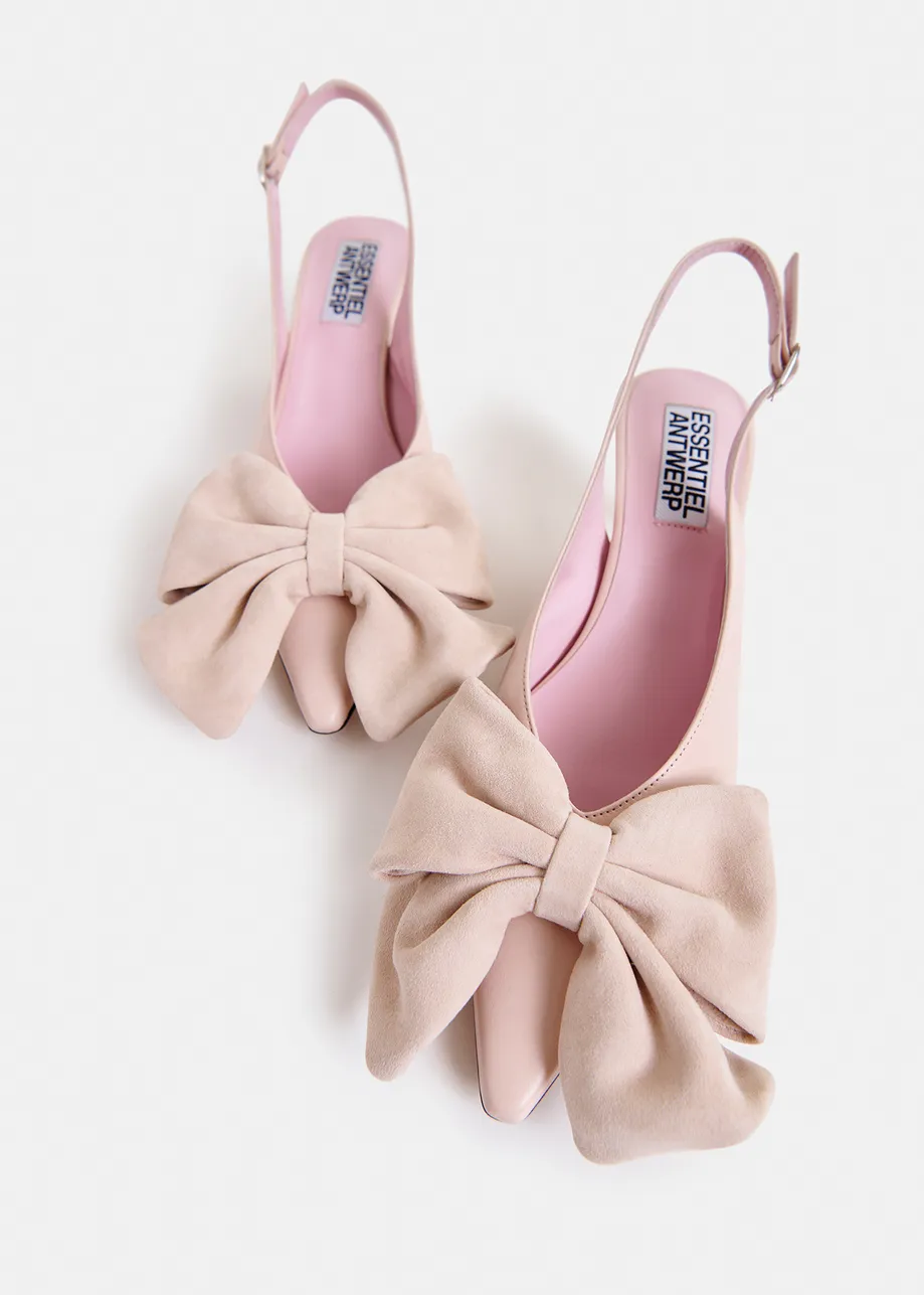 Light pink leather slingback pumps with bow detail