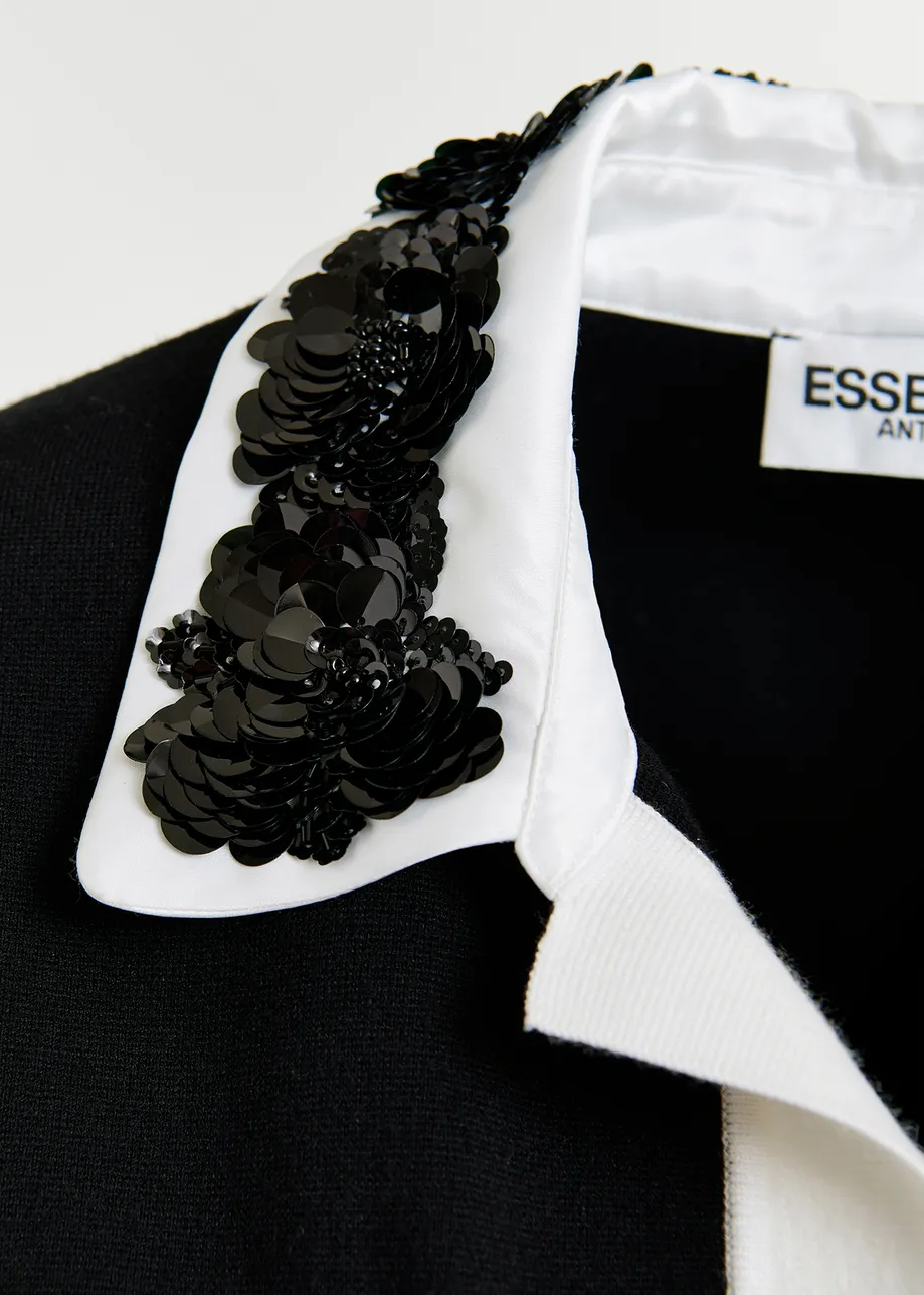 Black and white polo top with sequin and bead embellishments