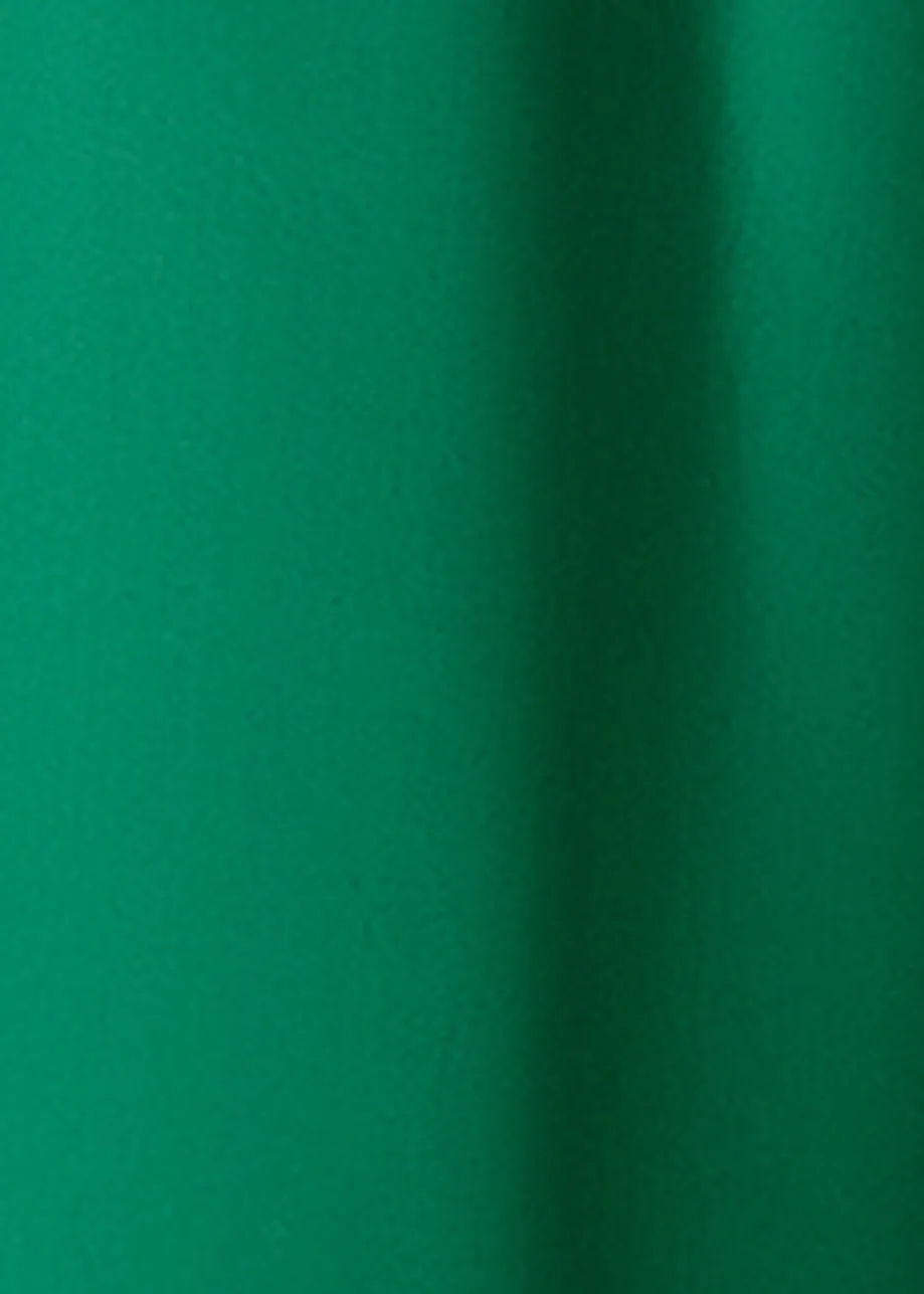 Green cotton maxi dress with voluminous sleeves and adjustable neckline
