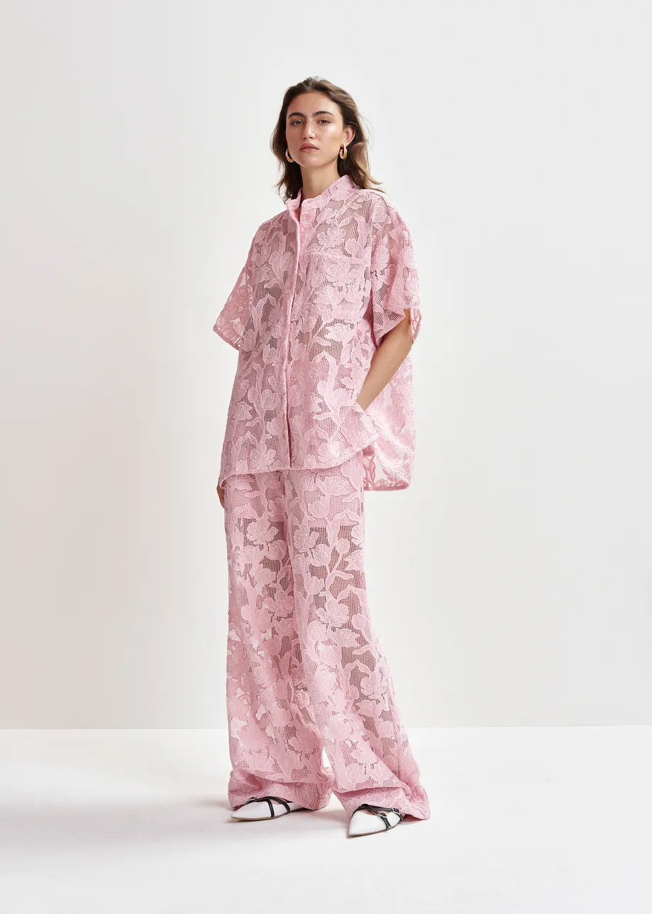 Light pink shirt with lace embroideries