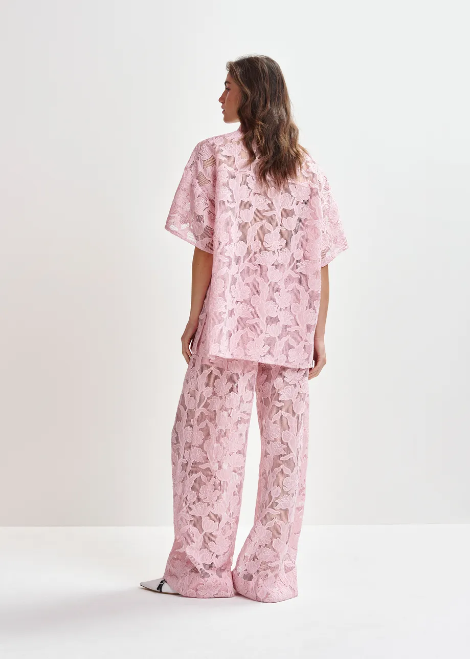 Light pink shirt with lace embroideries