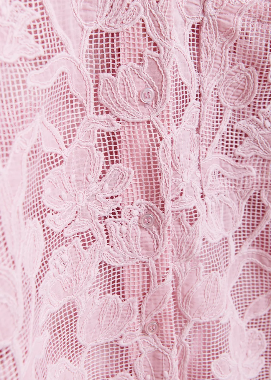 Light pink shirt with lace embroideries