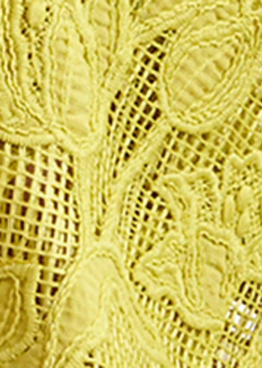 Yellow shirt with lace embroideries