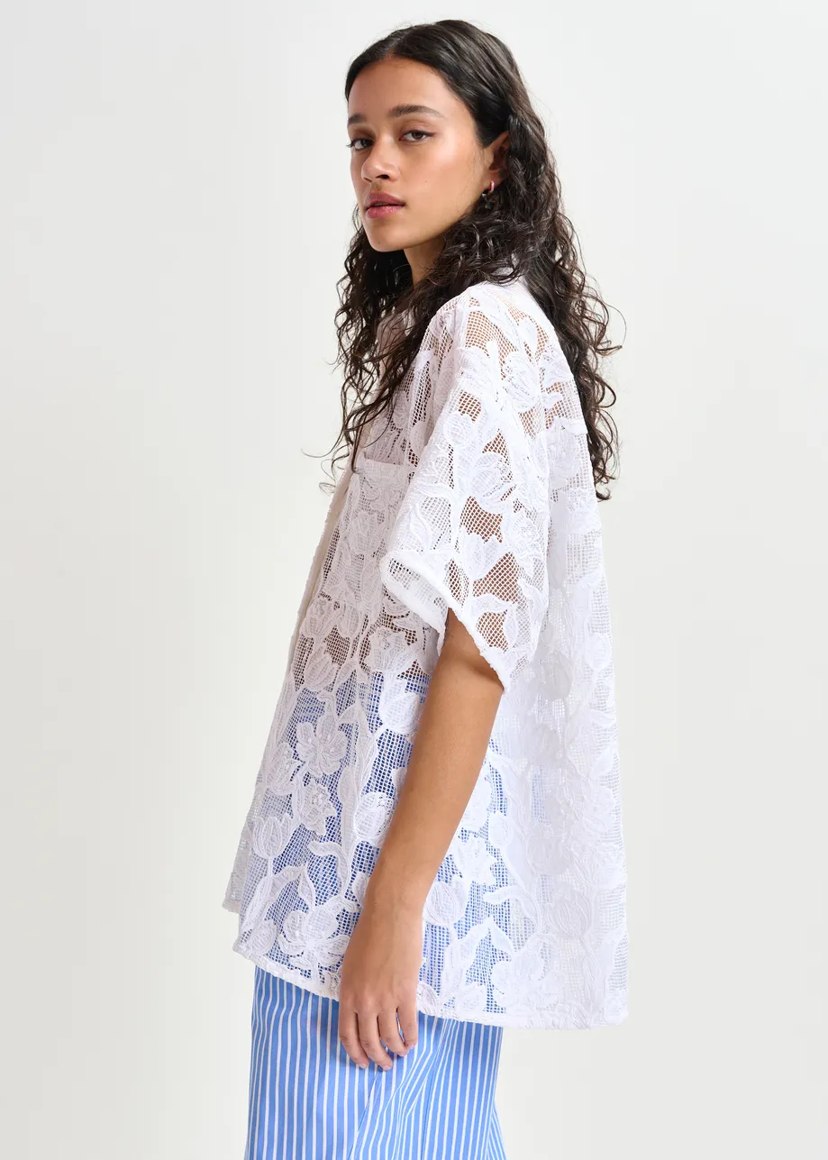 White shirt with lace embroideries