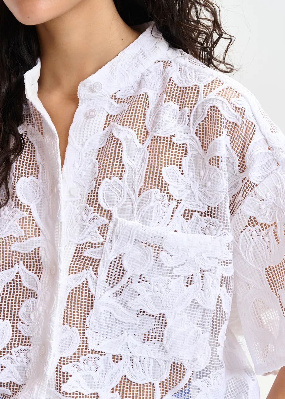 White shirt with lace embroideries