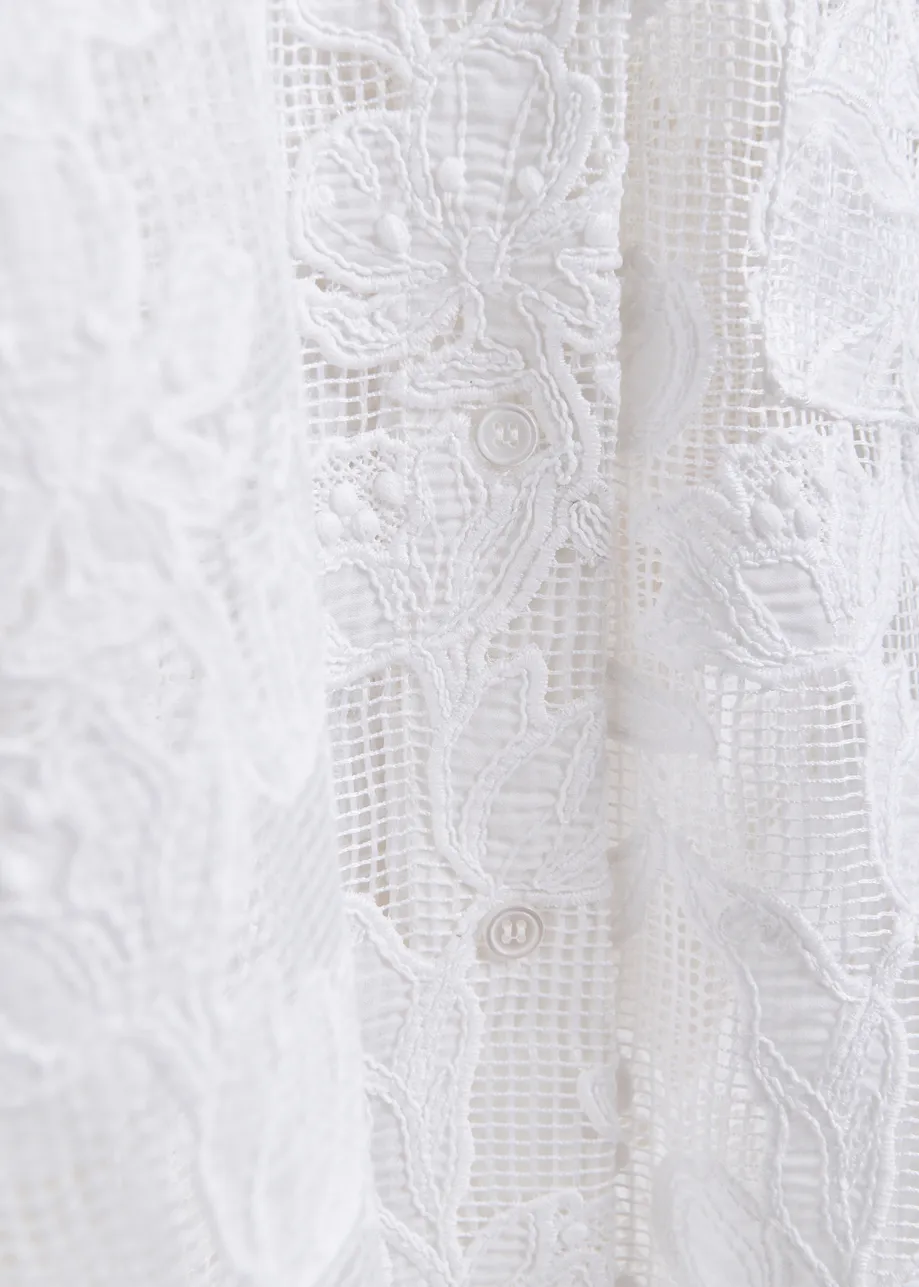 White shirt with lace embroideries