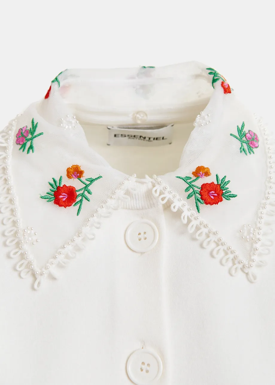 White, red and green cardigan with embroidered lace collar