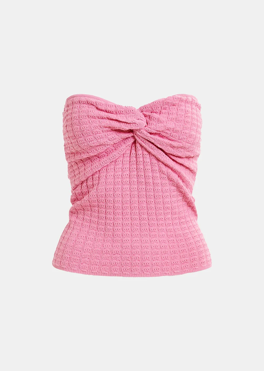 Light pink knitted strapless top