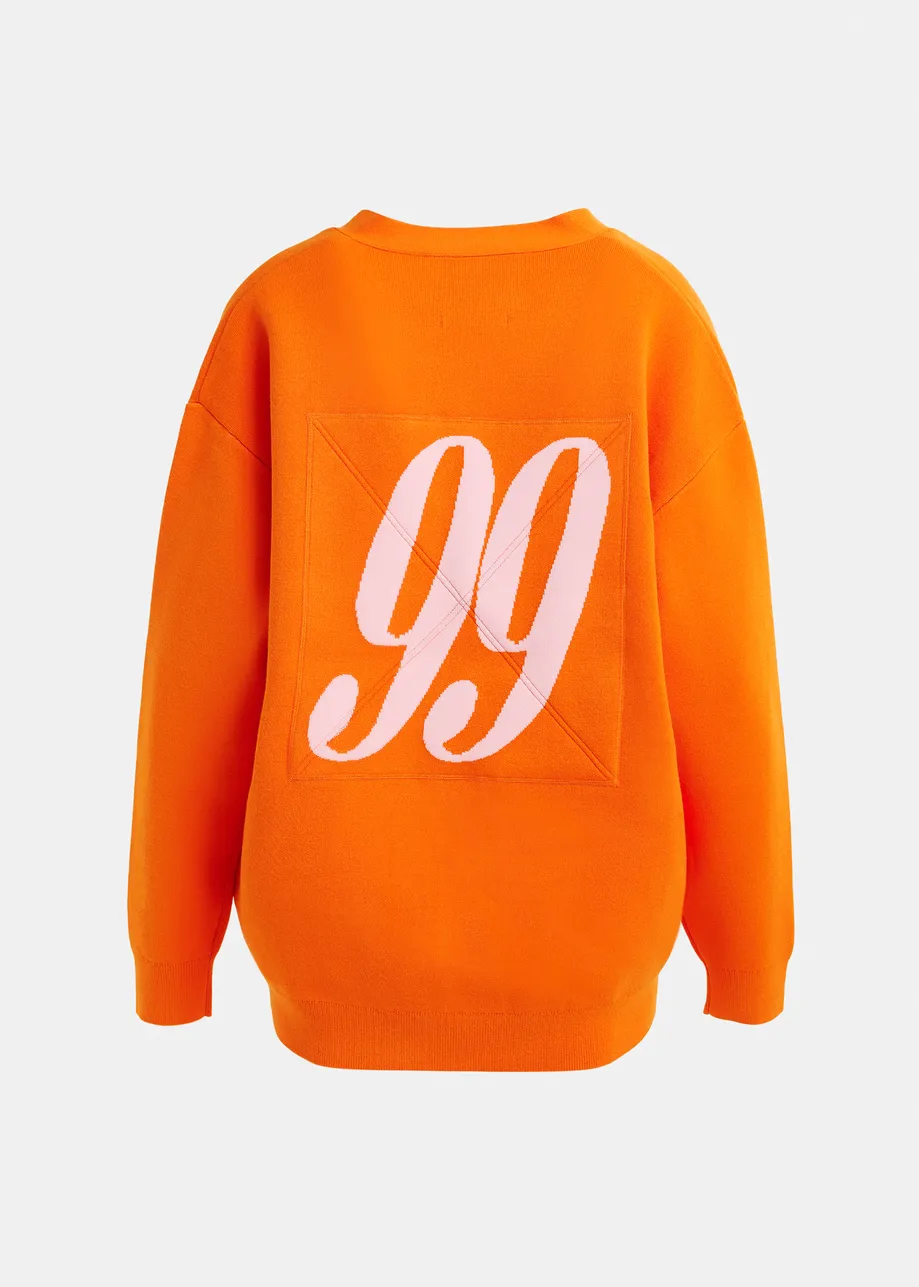 Oranje en roze cardigan met contrastboorden