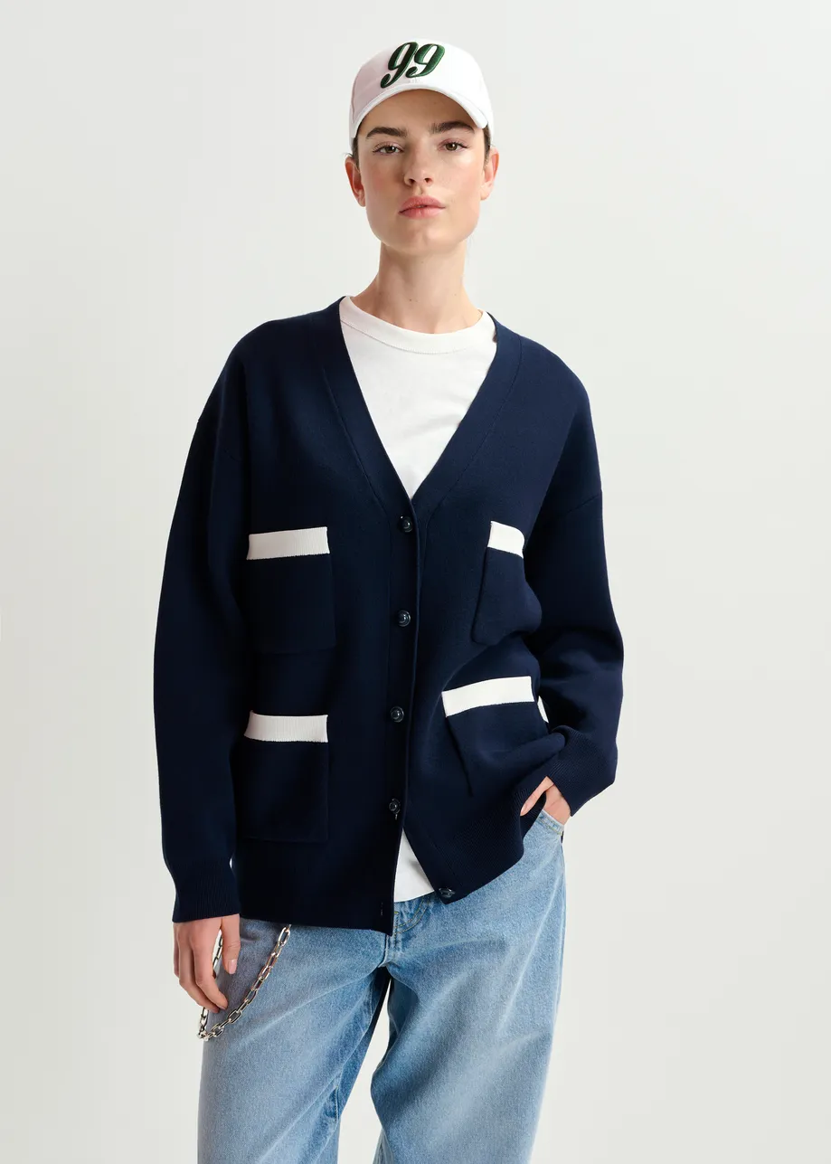 Dark blue and white knitted cardigan with contrasting trims