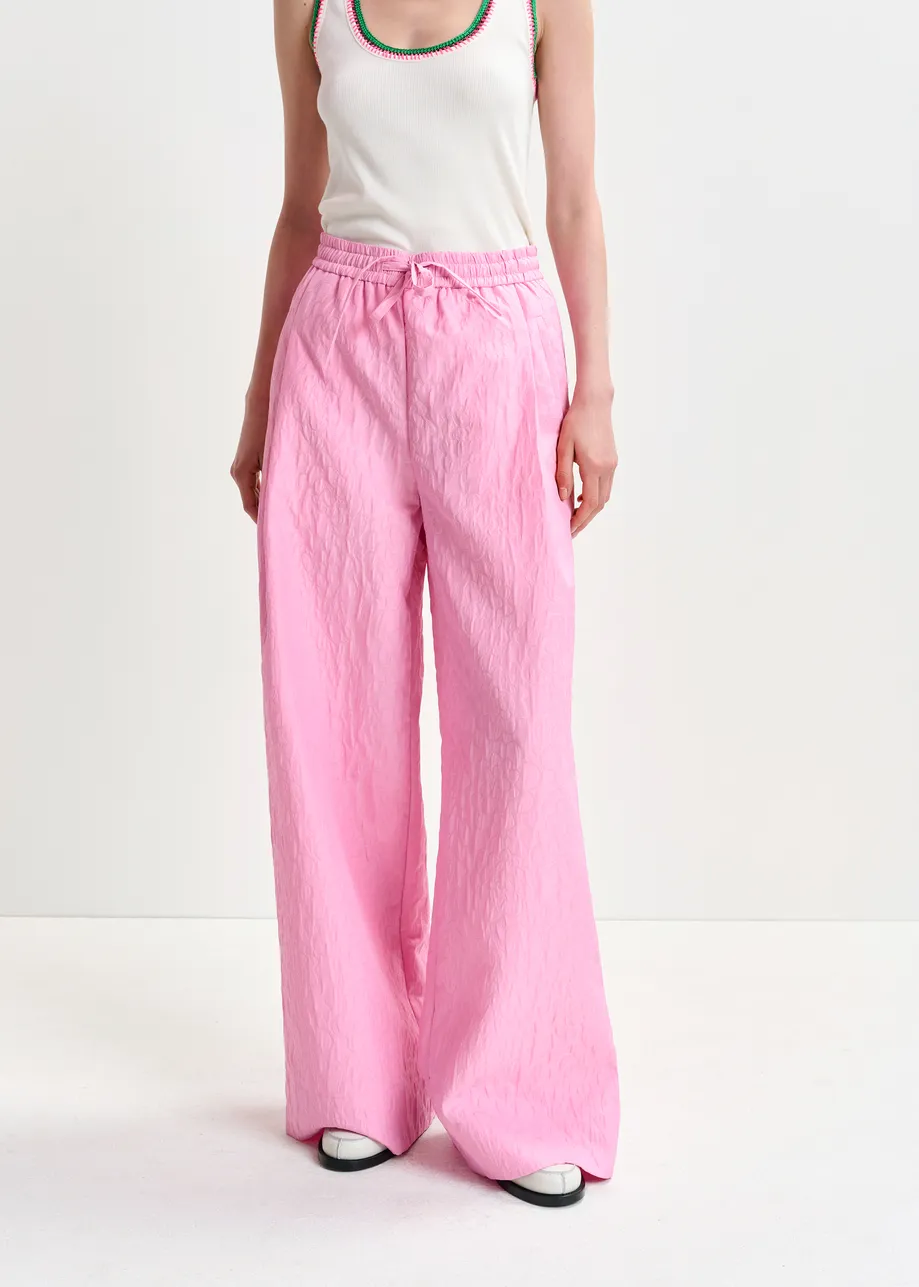 Pantalon large en jacquard fleuri rose