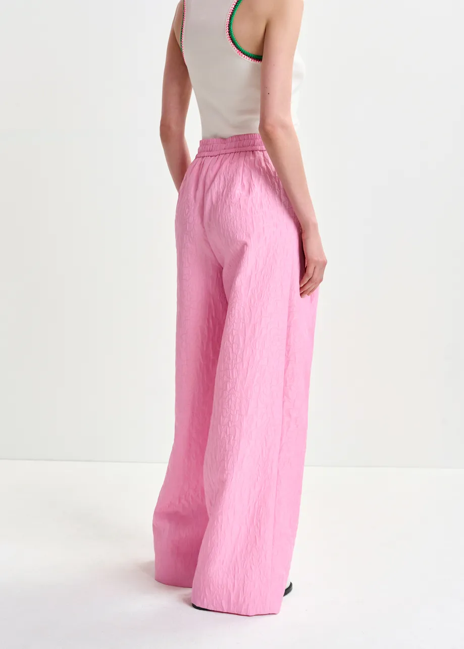 Pantalon large en jacquard fleuri rose