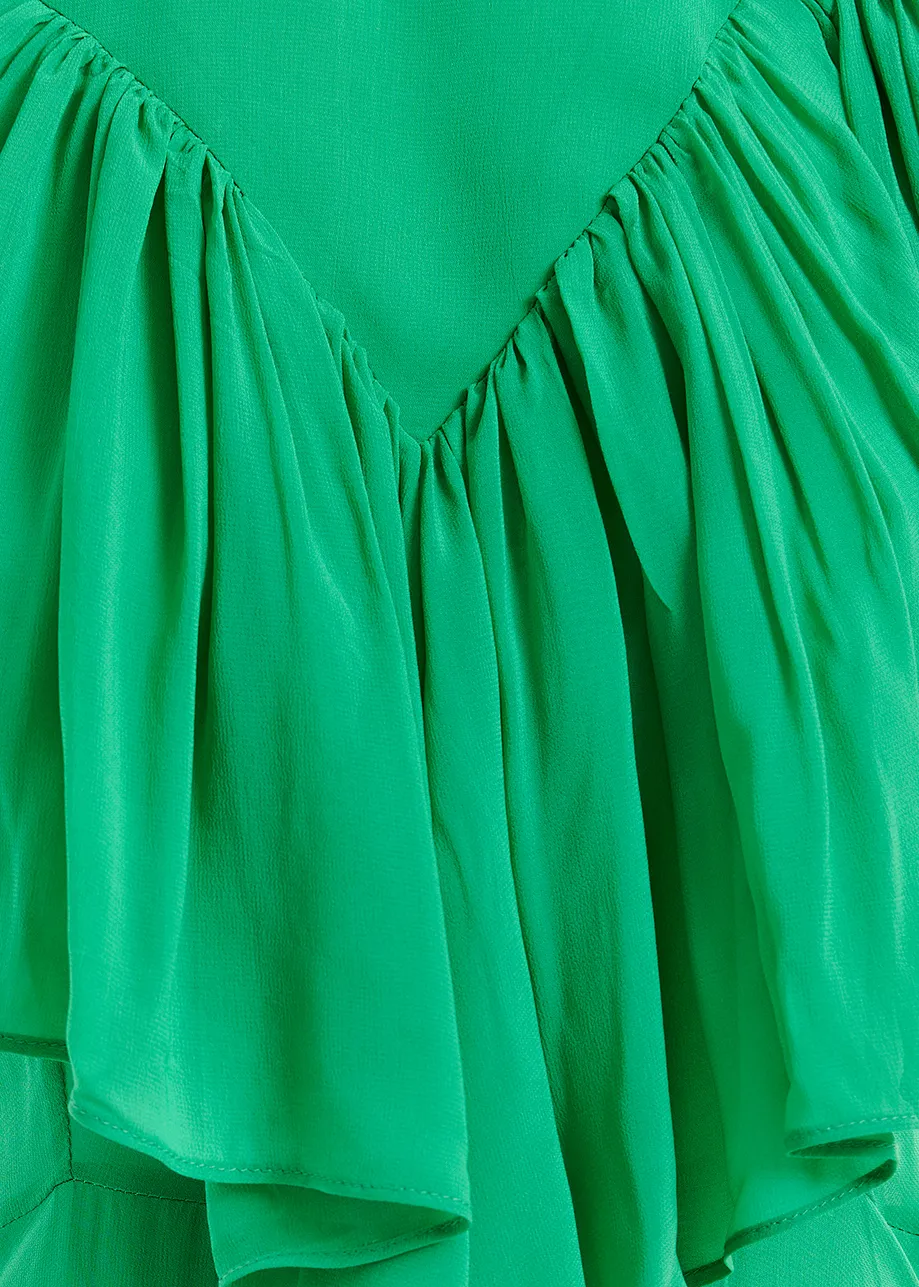 Green asymetrical midi dress with ruffle details