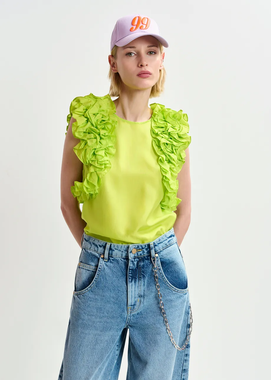 Top in seta verde lime senza maniche con volant