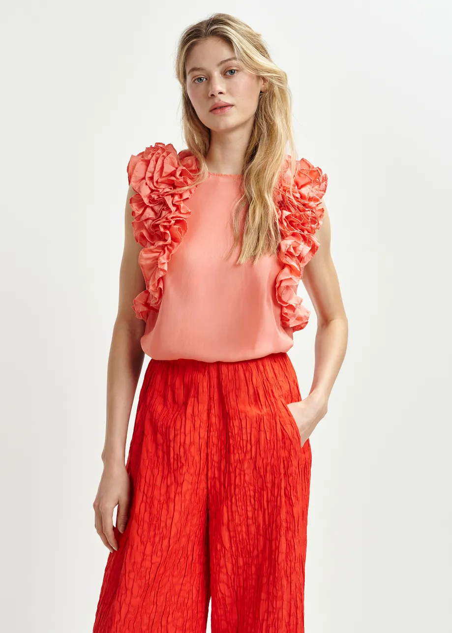 Coral silk sleeveless top with ruffles