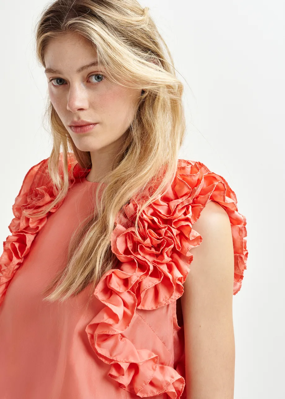 Coral silk sleeveless top with ruffles