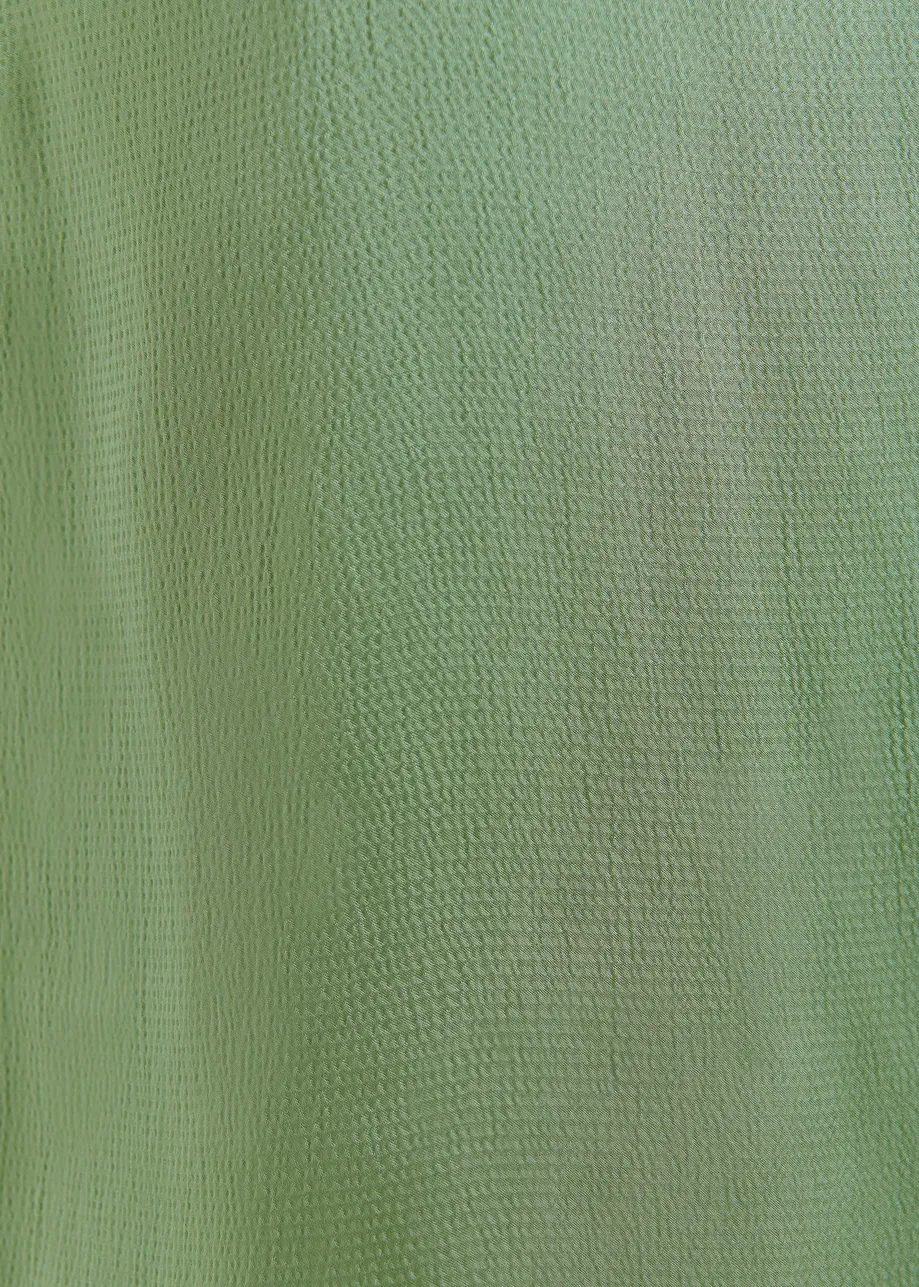 Green sleeveless top