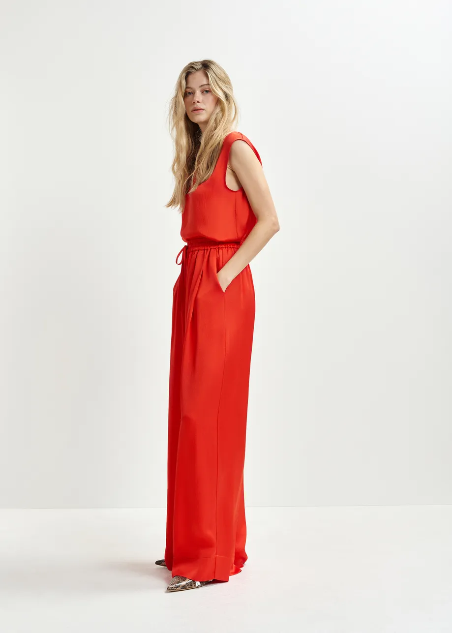 Red sleeveless top